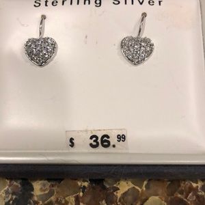Brand new, never worn Sterling Silver dangling heart earrings.